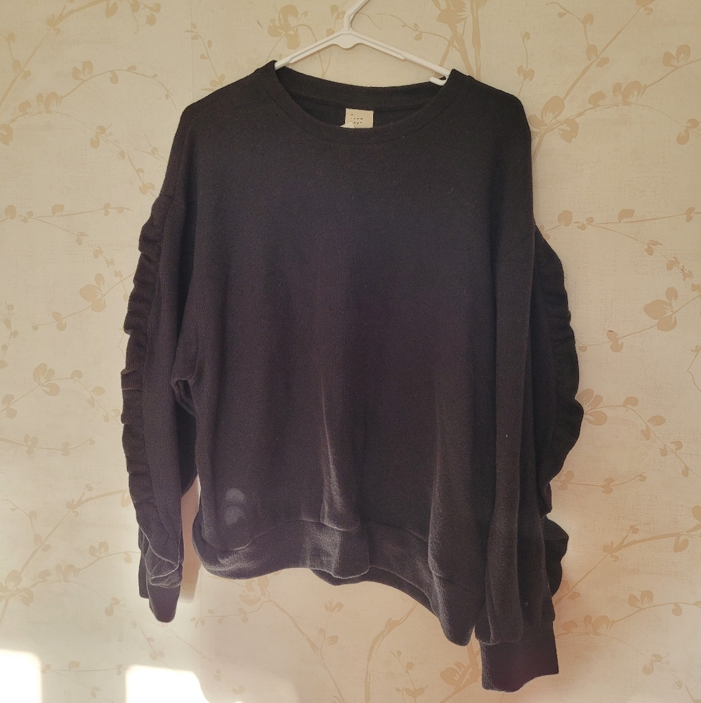 Black A New Day sweater with ruffled sleeves